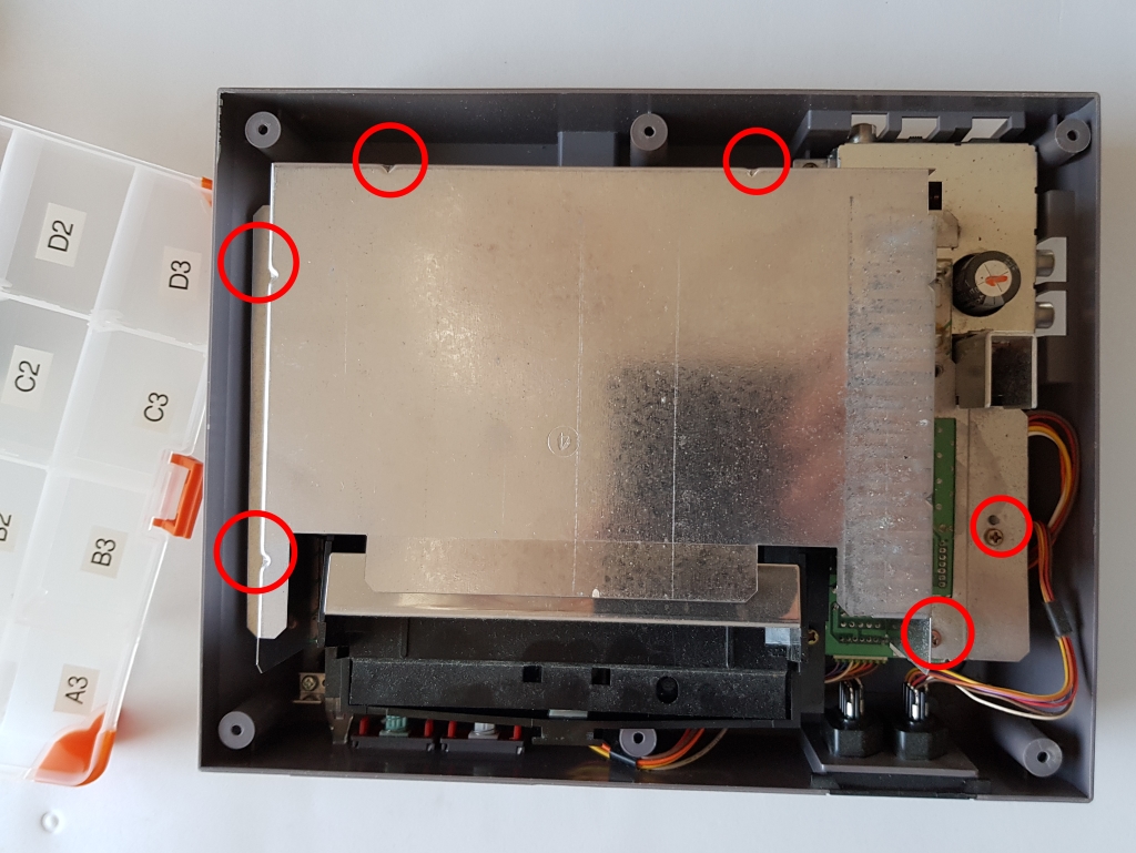 Screws holding the main RF shield NES